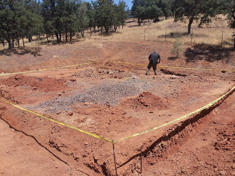 Excavation and rock removal at the building site